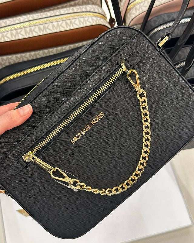 Michael Kors Jet Set Negra con Dorado *en existencia*