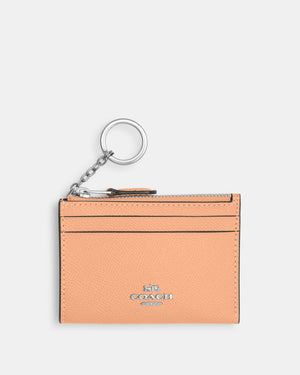 Everything You Need to Know About the Coach Mini ID Case