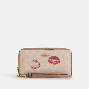 Coach Cartera Long Zip Around en Signature Canvas *bajo pedido*