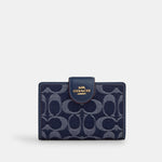 Coach Cartera Medium Corner Zip Denim en Signature Canvas *bajo pedido*